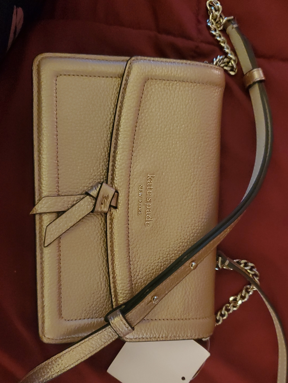 kate spade metallic gold pebbled leather crossbody with knot detail
